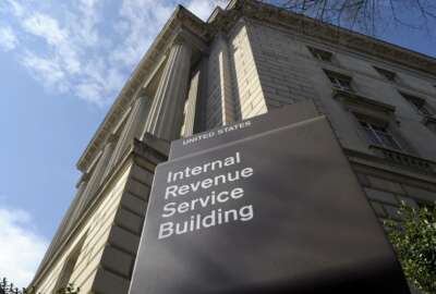 FILE - In this photo March 22, 2013 file photo, the exterior of the Internal Revenue Service (IRS) building in Washington. Lawmakers are increasingly looking at boosting the IRS to help pay for infrastructure improvements. (AP Photo/Susan Walsh, File)