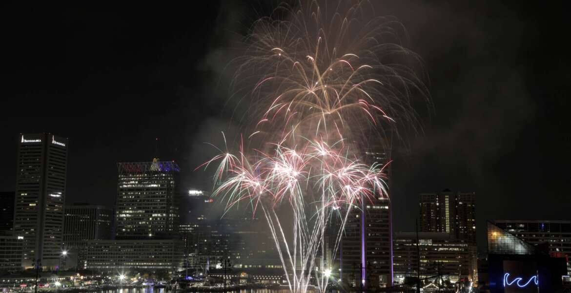 FILE - Fireworks explode over Baltimore's Inner Harbor during the Ports America Chesapeake 4th of July Celebration, Thursday, July 4, 2019, in Baltimore. The city of Baltimore is resuming its Independence Day celebrations after a two-year hiatus. (AP Photo/Julio Cortez, File)